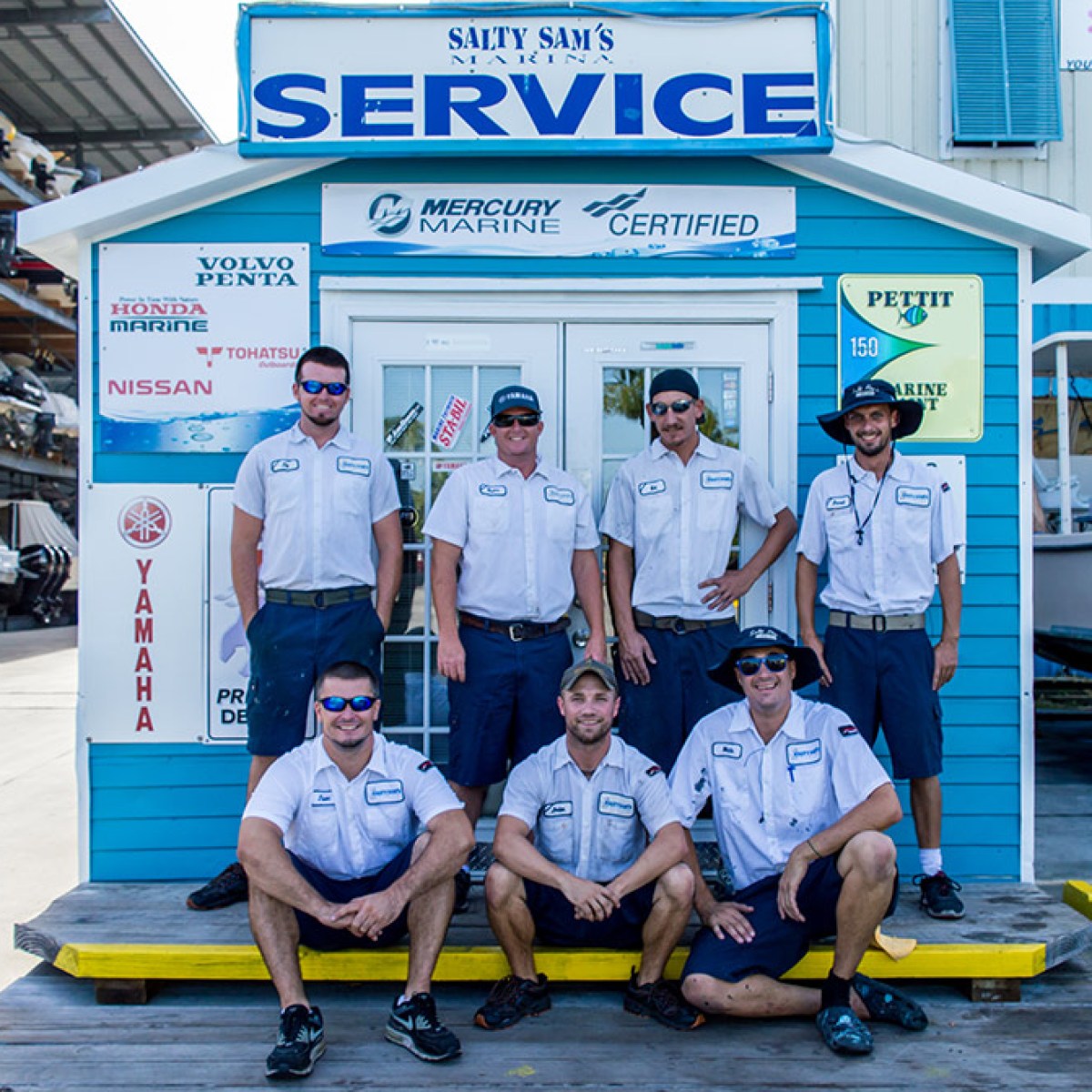a group of people standing in front of a building