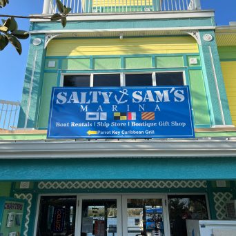 a sign in front of a building